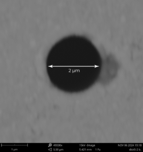 Micromachining Services 4 Laser drilled 2 micron hole